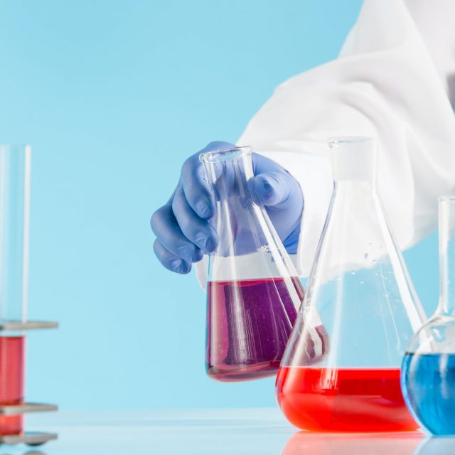 Experiments in a chemistry lab. conducting an experiment in the laboratory.