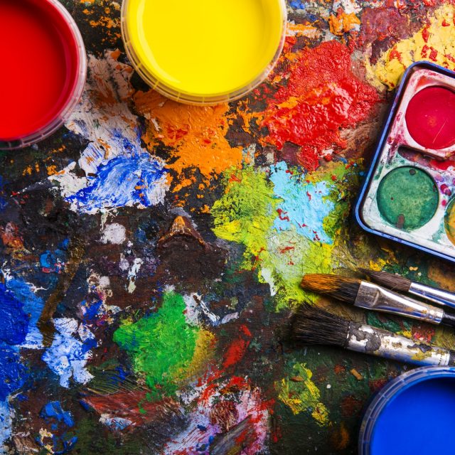 Watercolor paints and paintbrushes